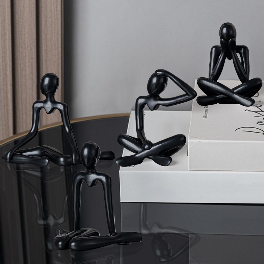 black statues thinker
