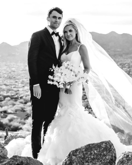 Erika and Charlie Kirk wedding portrait in Scottsdale, Arizona, with mountains in the background
