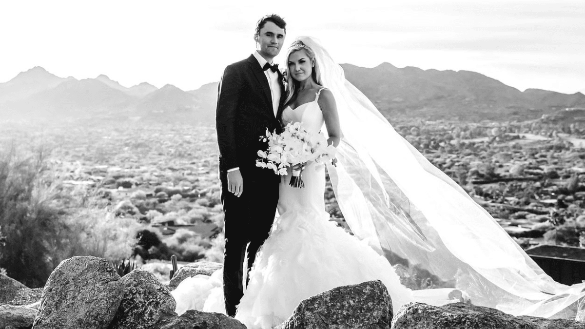 Erika and Charlie Kirk wedding portrait in Scottsdale, Arizona, with mountains in the background