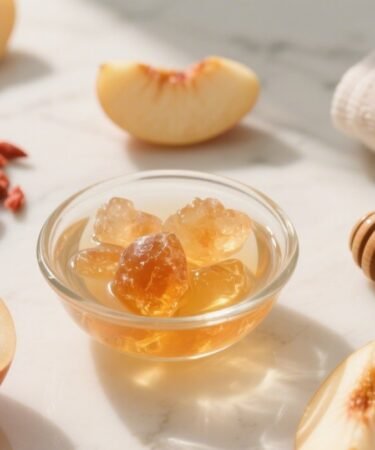 Natural peach gum resin — golden translucent remedy for glowing skin and hydration.