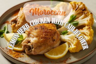 Moroccan lemon herb chicken served with roasted cauliflower, seasoned with garlic, turmeric, cumin, and fresh herbs.