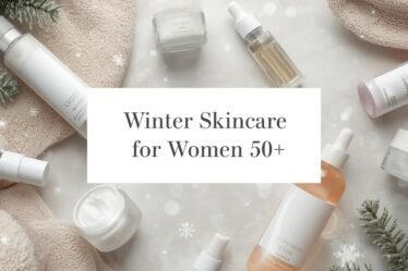Winter skincare flatlay with hydrating creams, oils, and winter elements designed for women over 50.