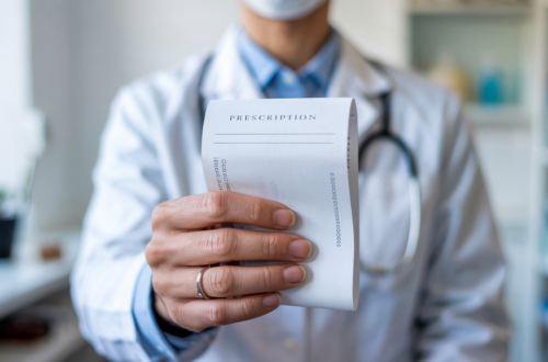 Healthcare professional holding prescription paper representing antiviral treatment for H3N2 super flu
