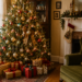 Vintage Christmas tree decorated with mercury glass ornaments, warm lights, and restrained tinsel.